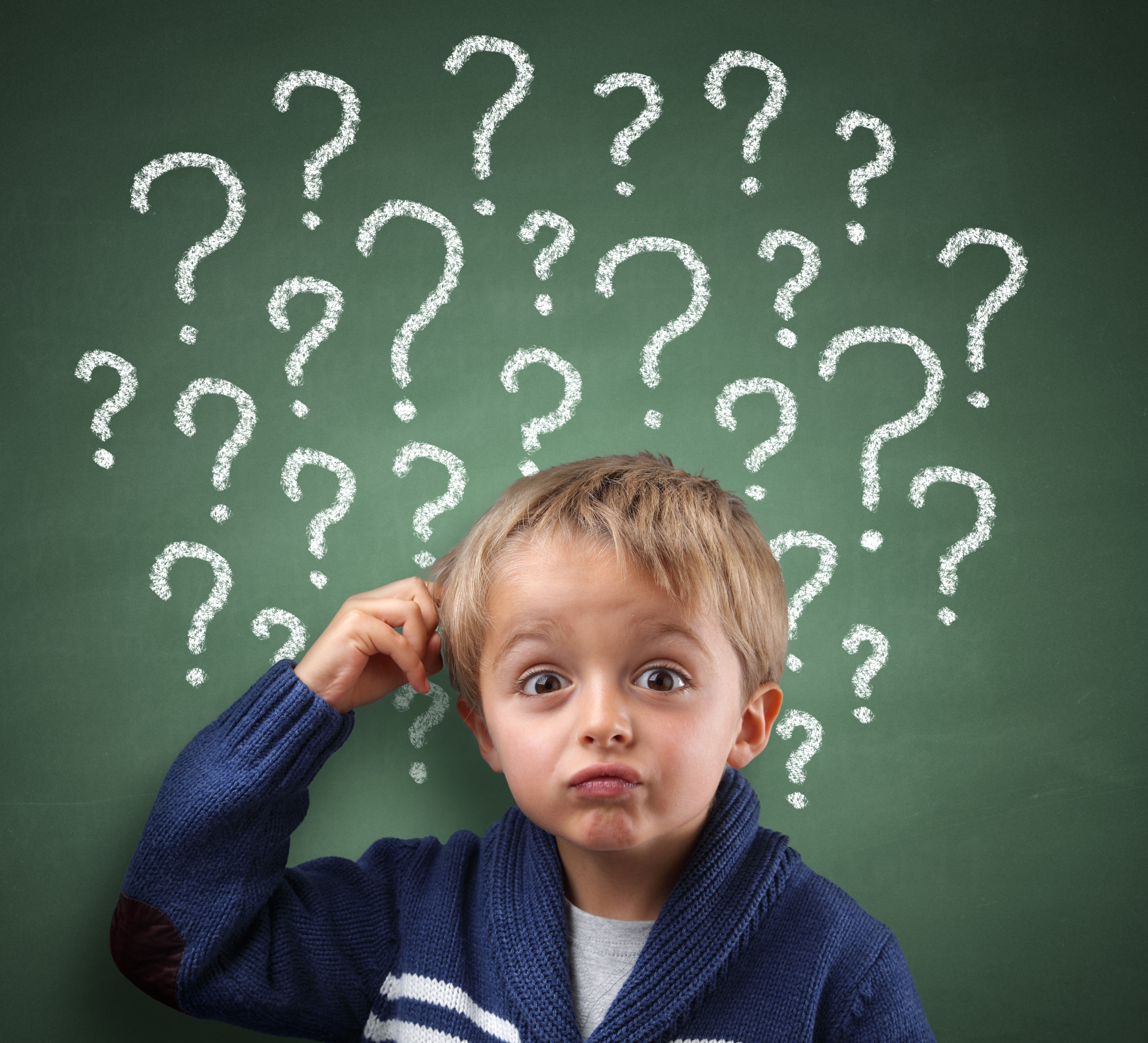 Child scratching head with question mark on blackboard concept for confusion, brainstorming and choice